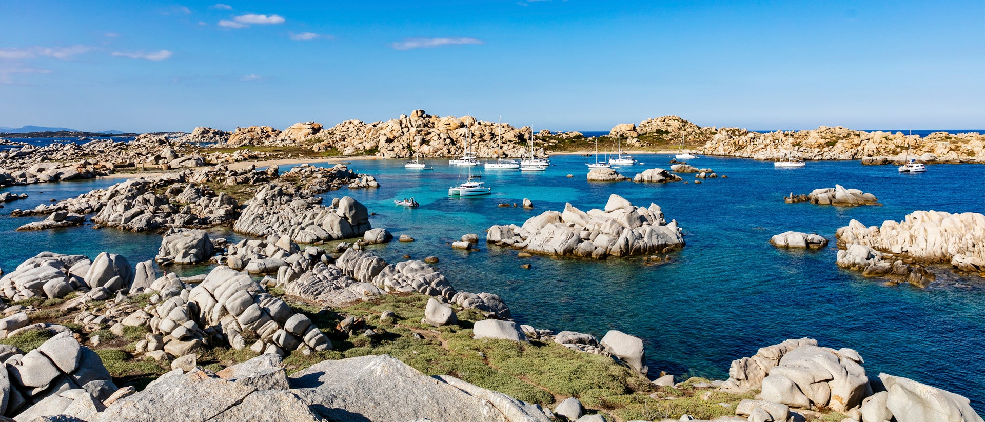 Corsica coast landscape sailboats