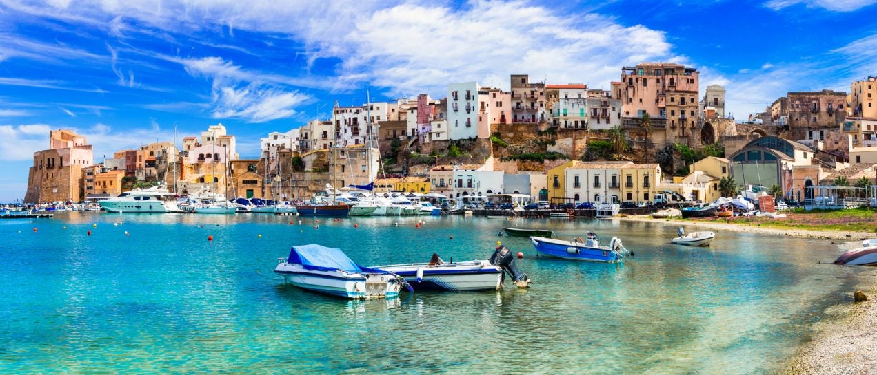 Sicily crystal water port colorful old town houses landscape