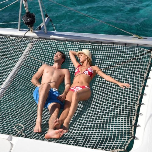 Lavrion happy couple luxury relaxing in yacht charter