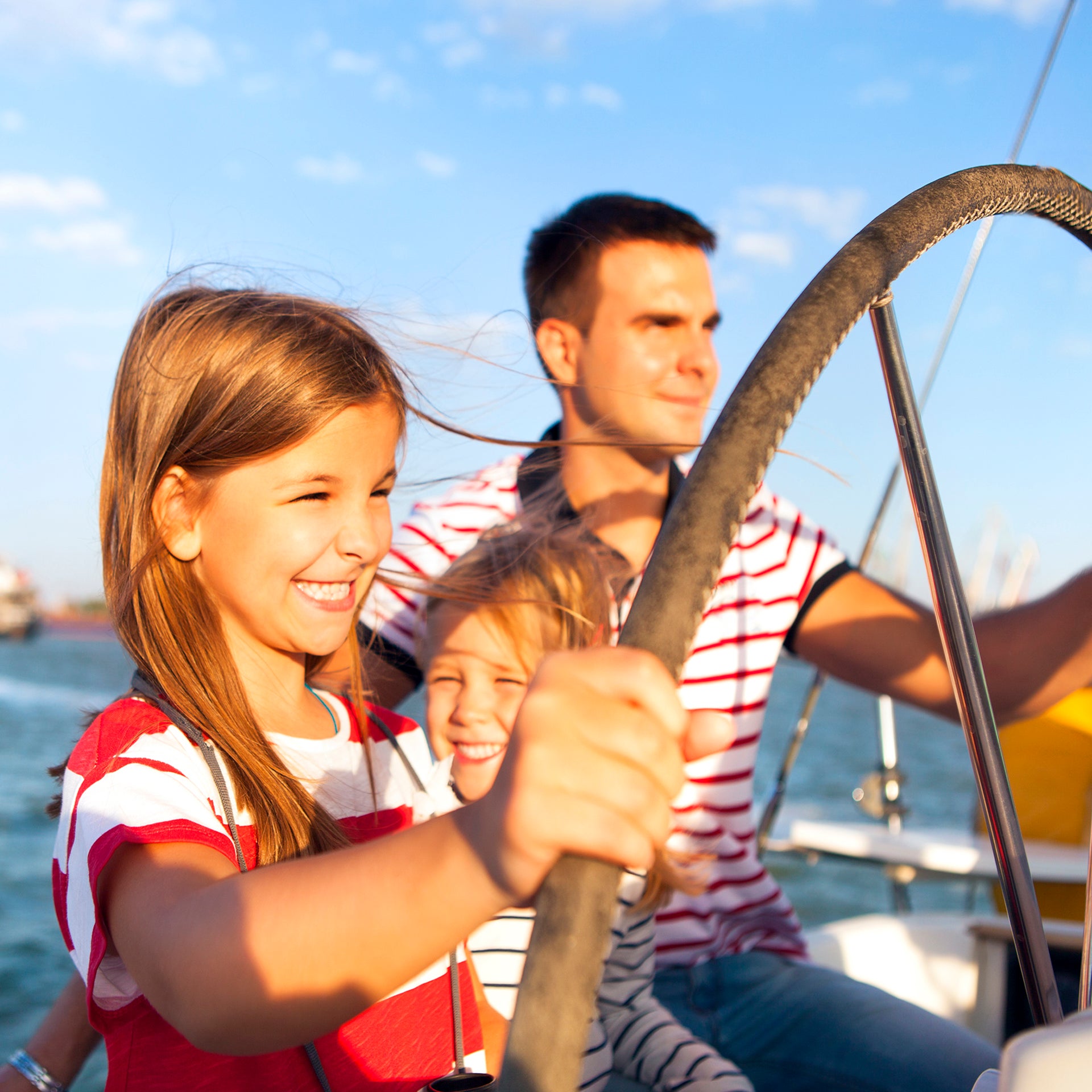 Sweden happy family sailing charter