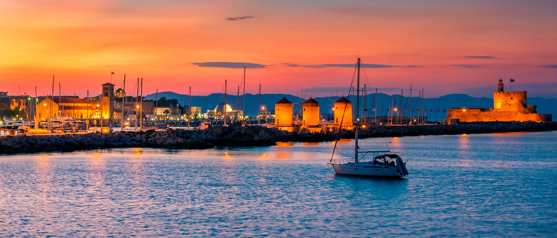 Greece coast windmills village and skippered yacht