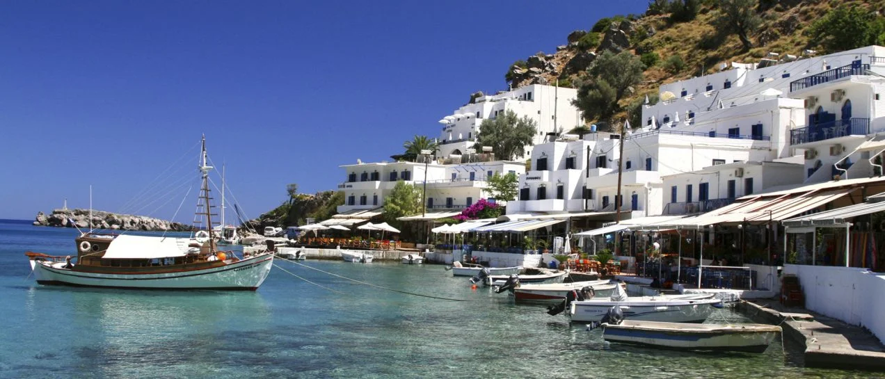 Greece village at the coast bars and yachts charters