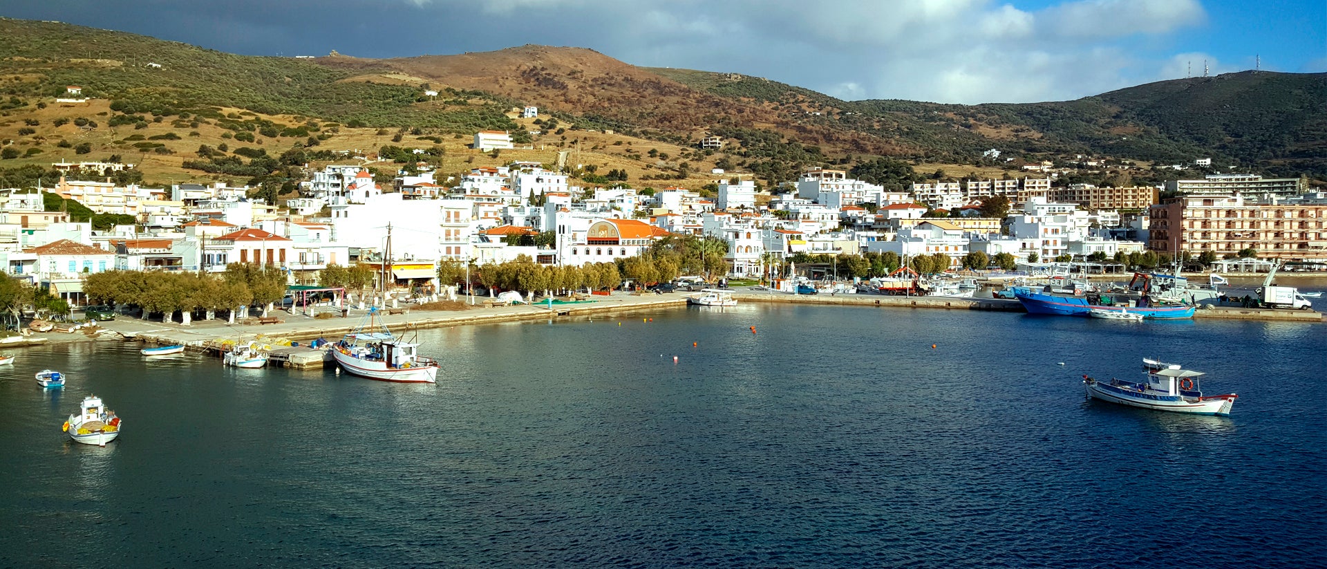 Lavrion port white town sailing