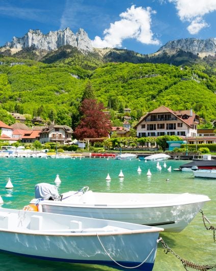 France village castle and bay with yachts and boats