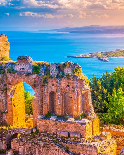 Sicily colorful port sailboats white houses sailing charter