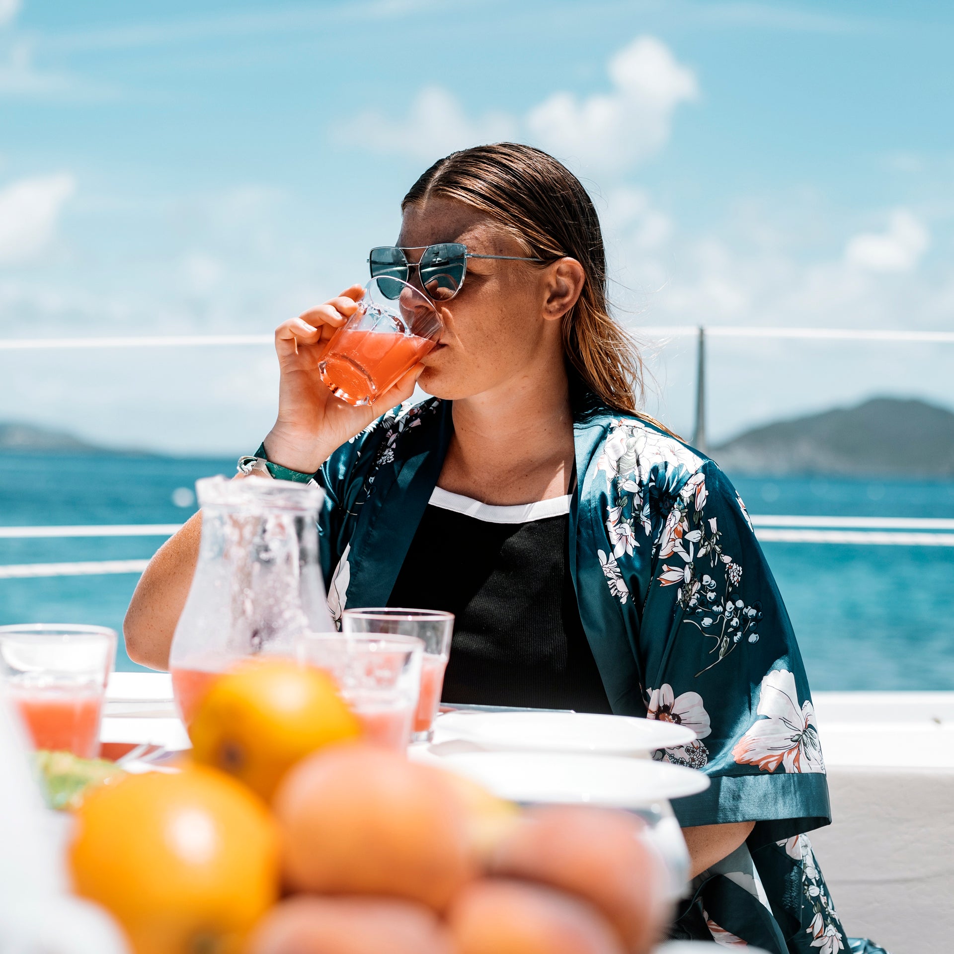 Woman enjoying a meal in yacht charter