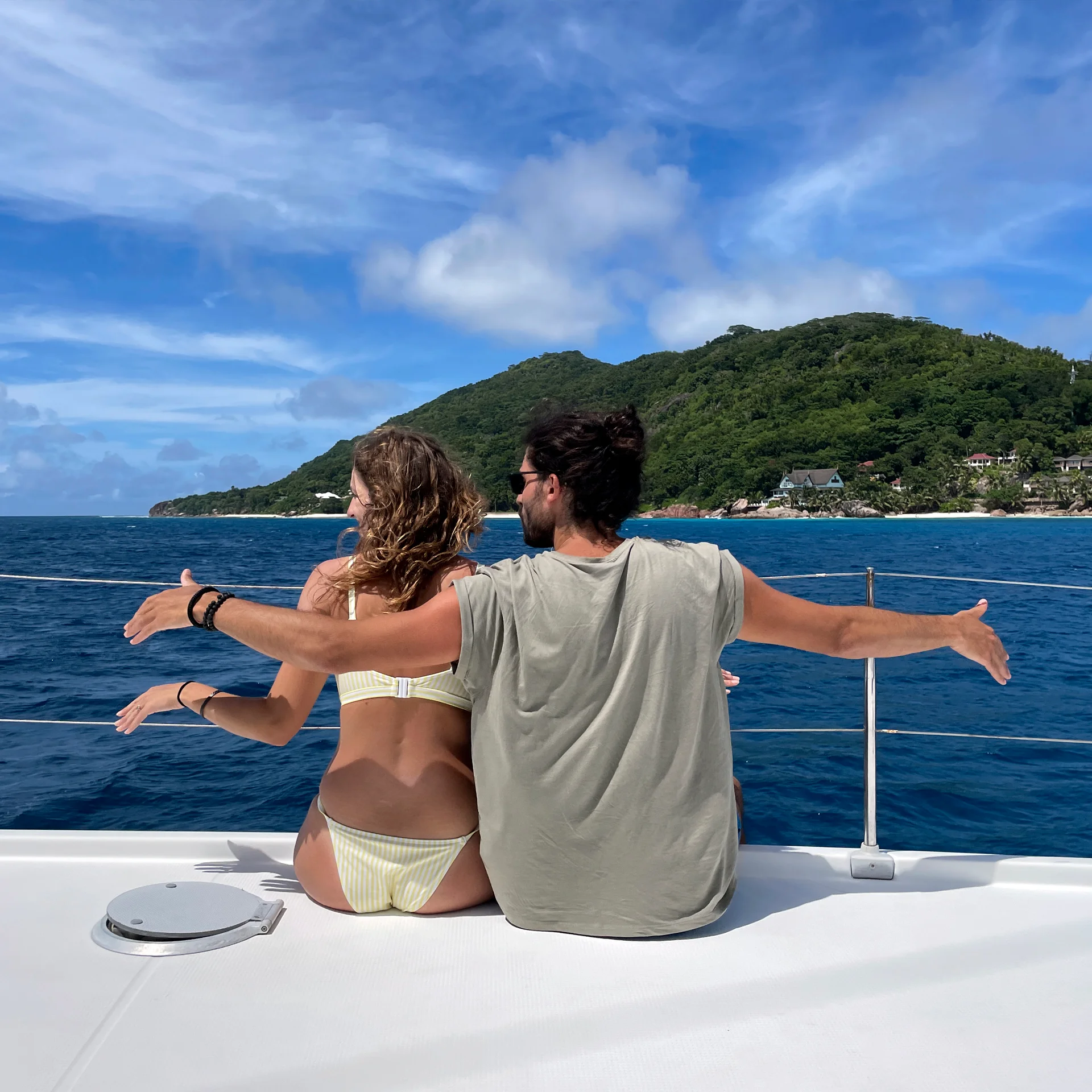 Happy couple on board of a yacht charter