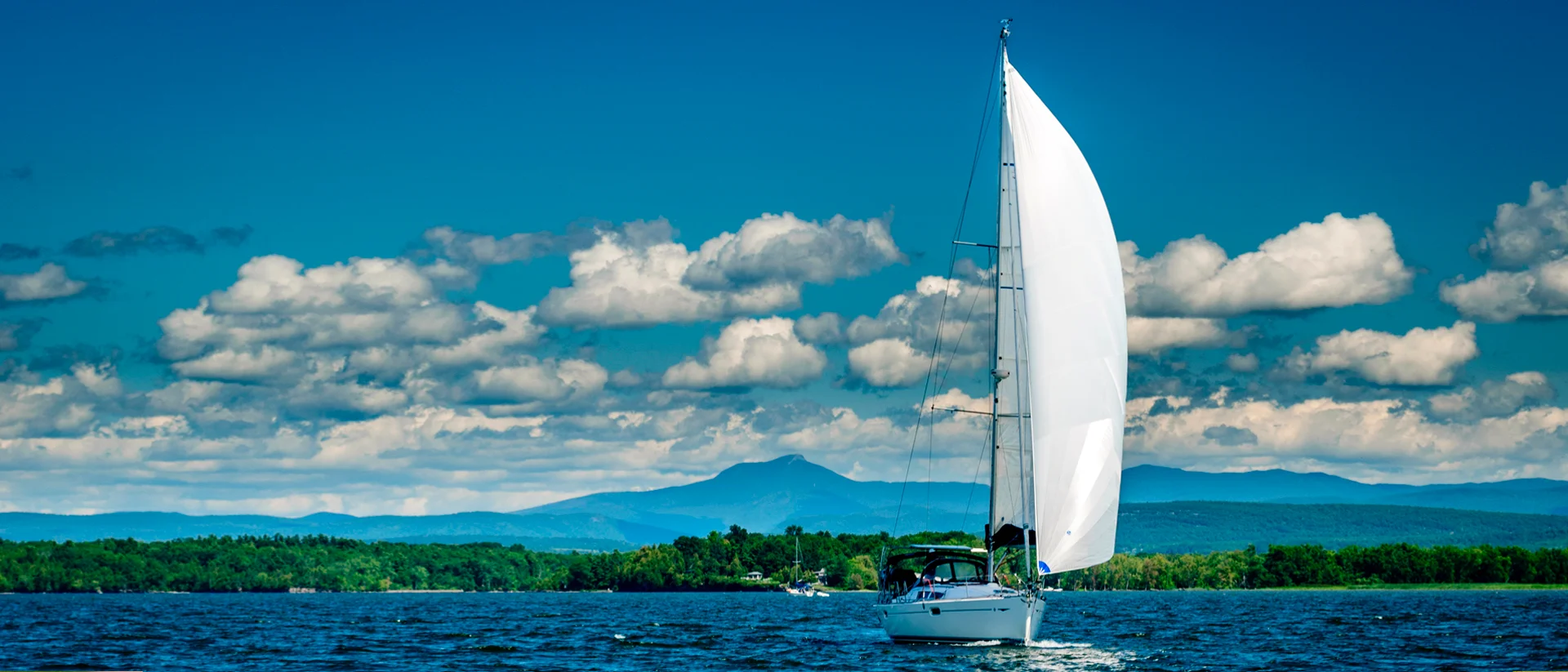 Yacht charter sailing in a beautiful landscape