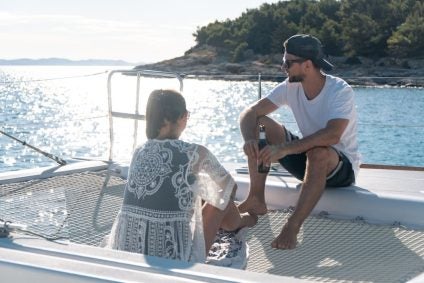 two people on yacht trampoline