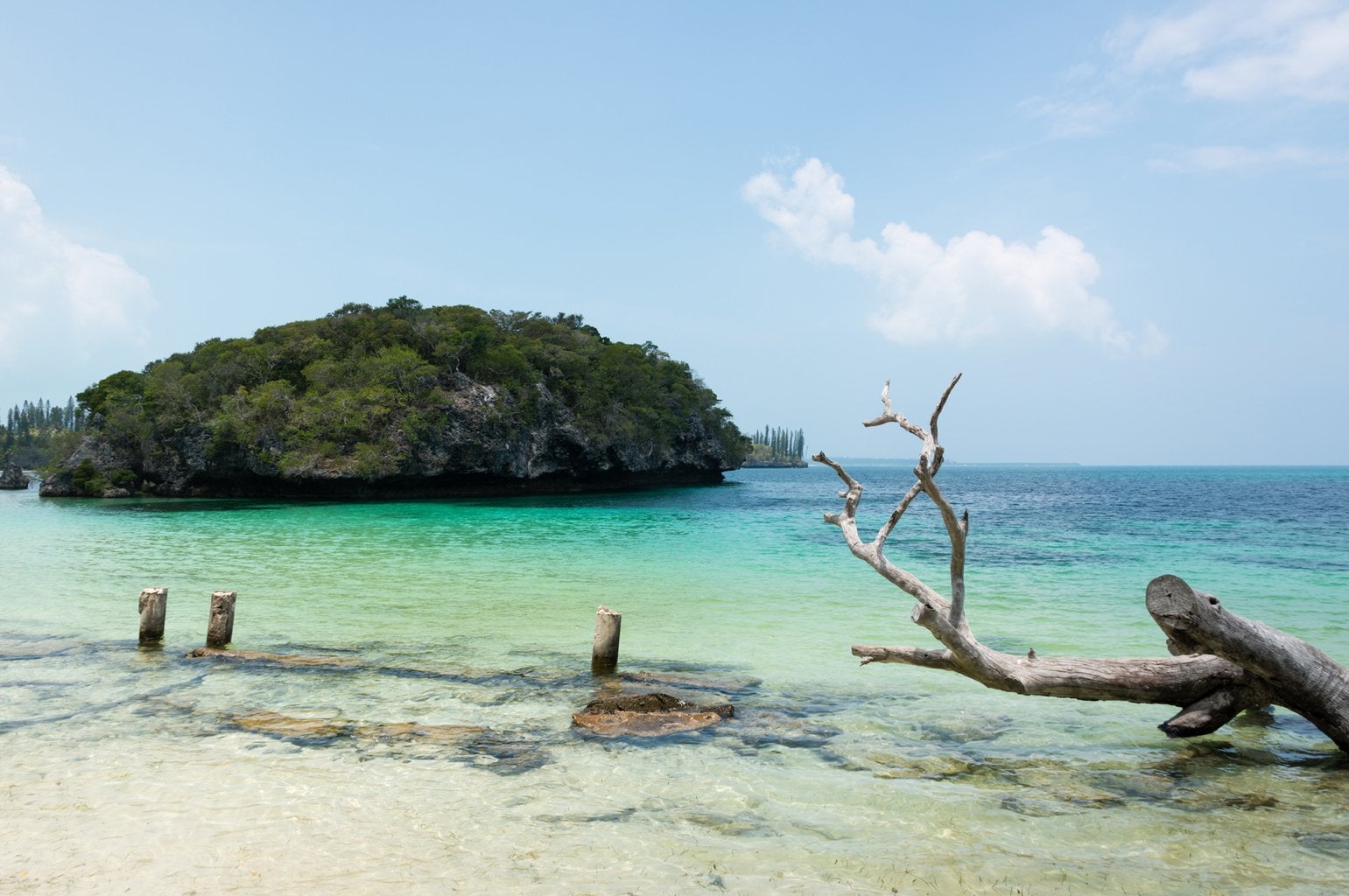 rocky island off the shore of new caledonia
