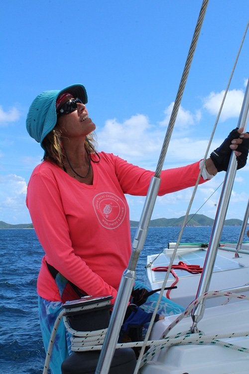 Woman sailing with hat