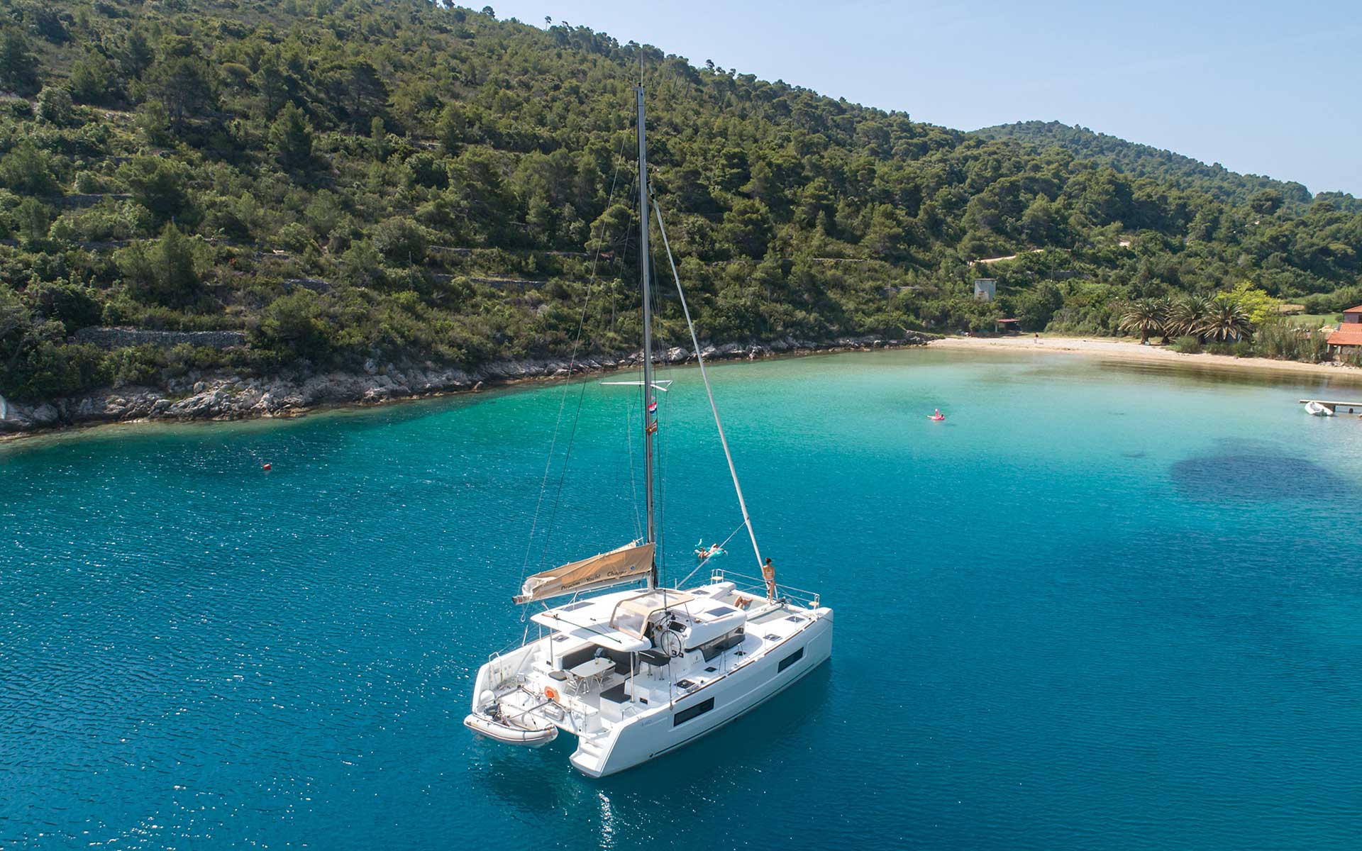 boat sailing near island