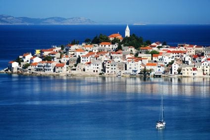Sailboat approaching the Dalmatian coast of Croatia