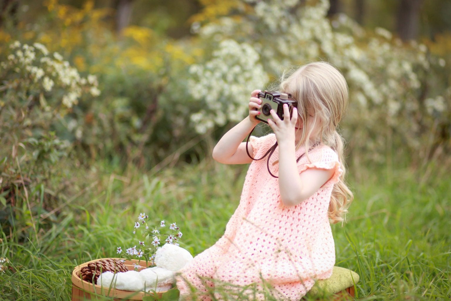 photo of child with camera