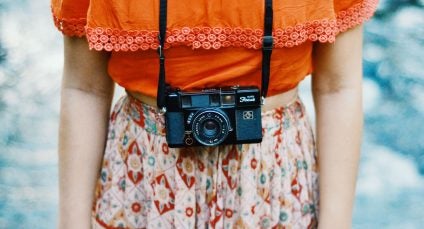 photo of woman with camera