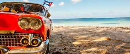 Classic Cuban car on beach in Cuba