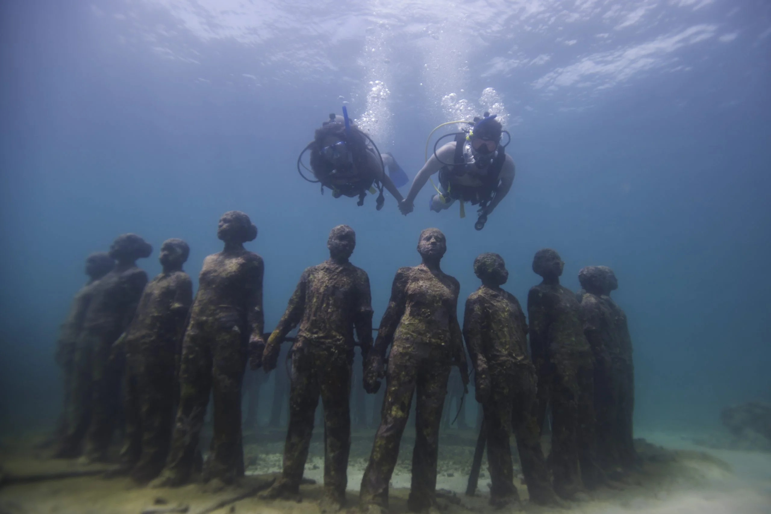 divers at the Grenada Underwater Sculpture Park