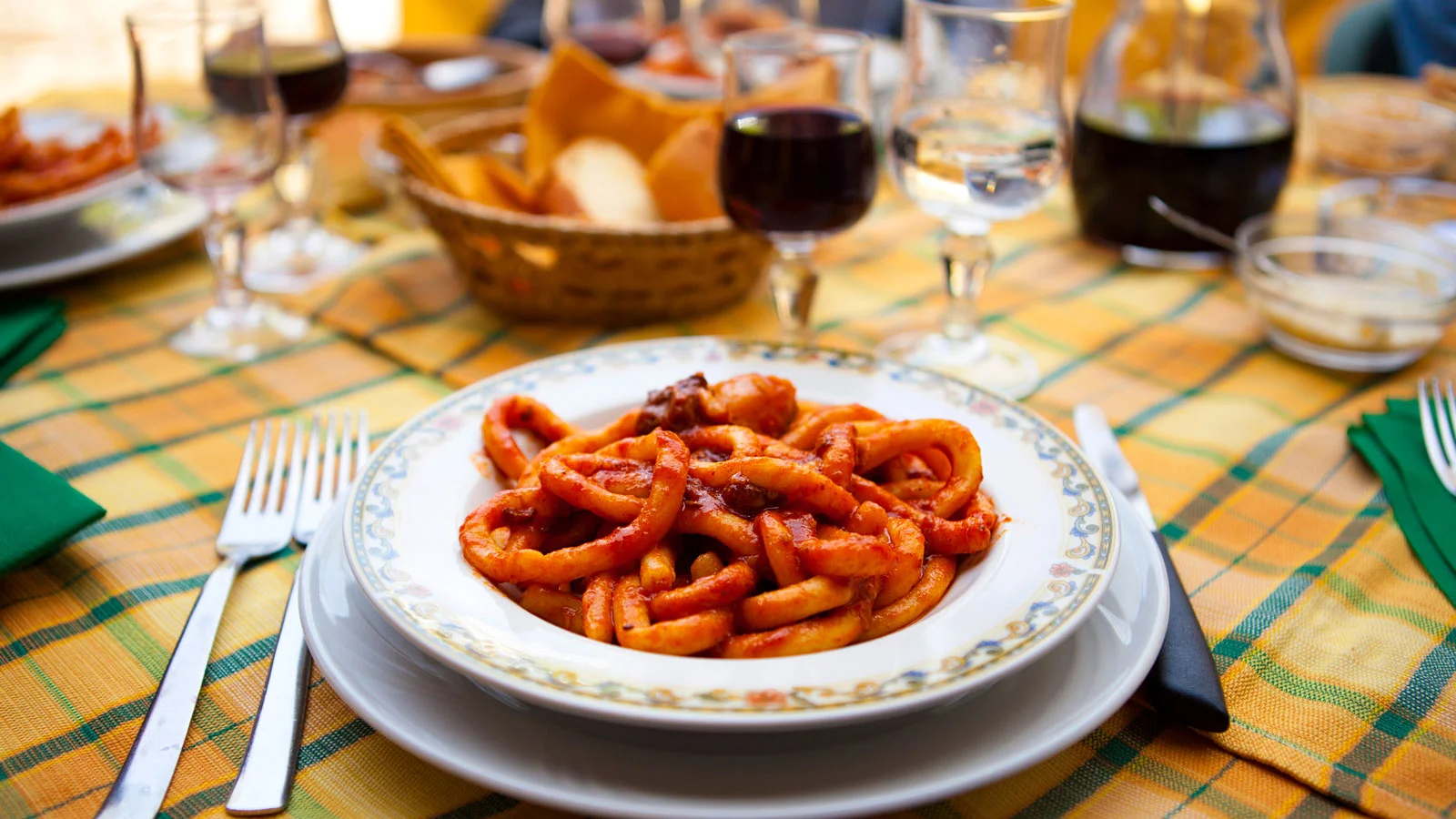 sicily table with pasta and wine foodie