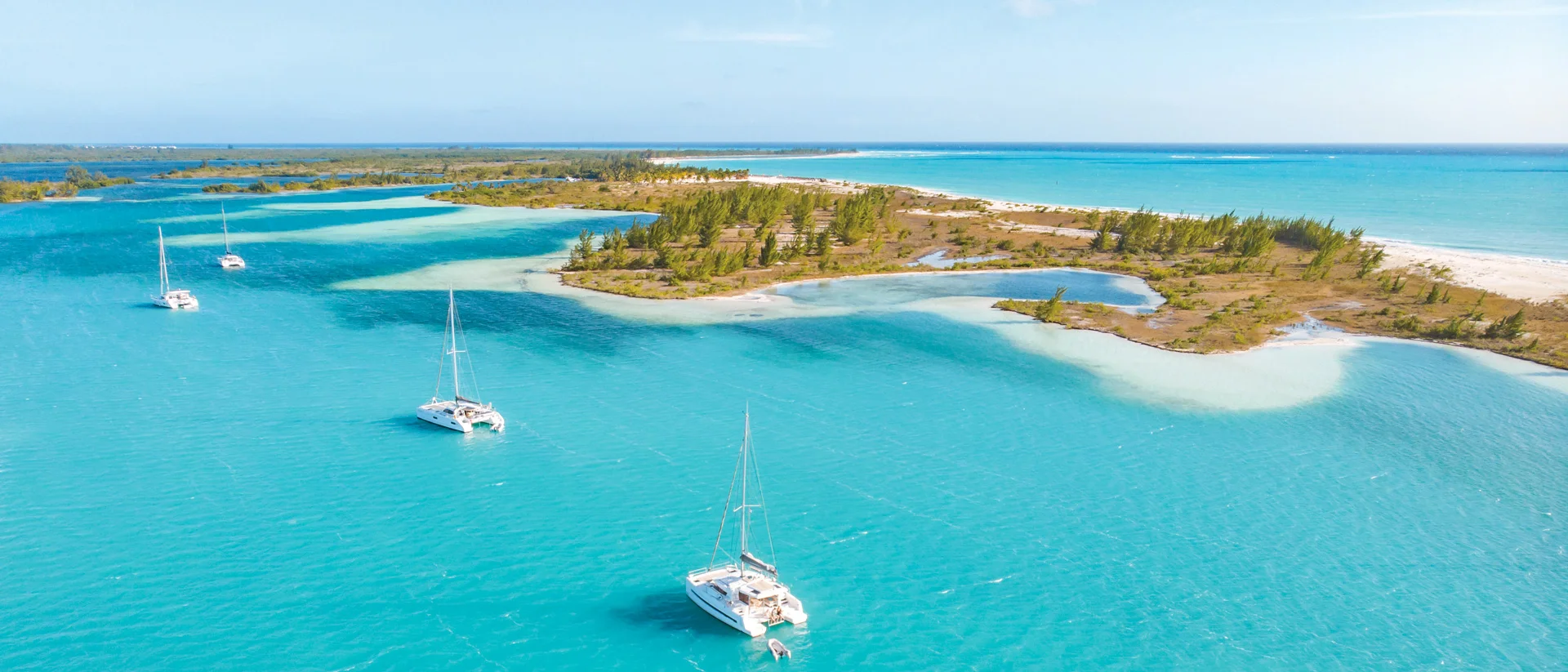charter anchorage with boats & pristine beaches for sustainable sailing