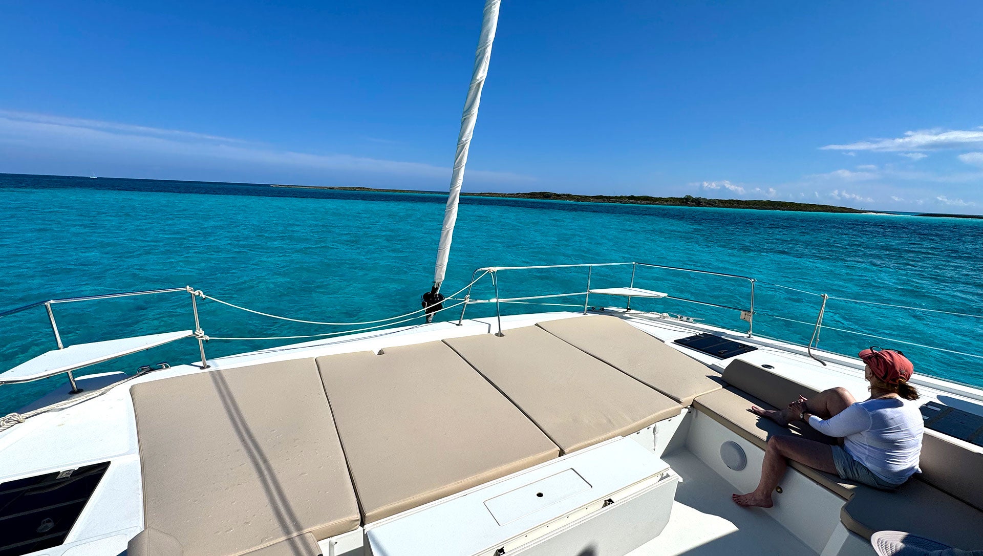 Sailing catamaran on blue water in the Abaco Islands, Bahamas