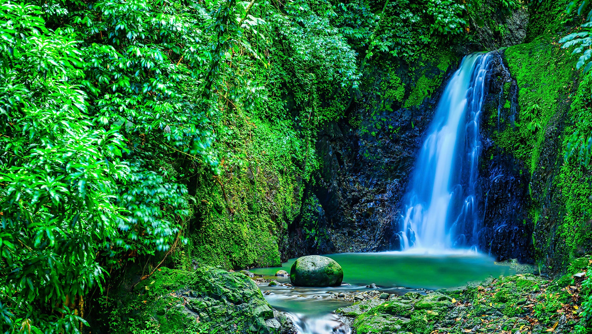 Three Sisters waterfall on trail while hiking in Grenada