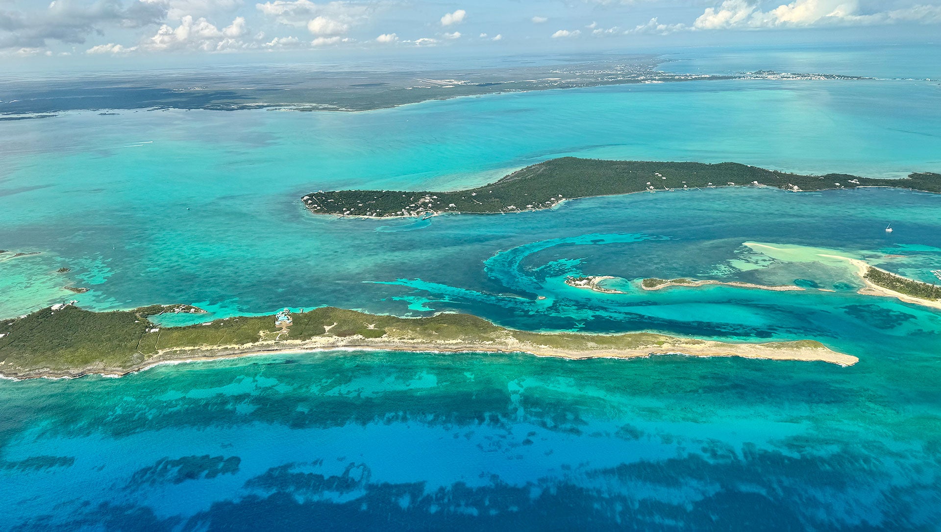 view from flight into abaco islands, bahamas