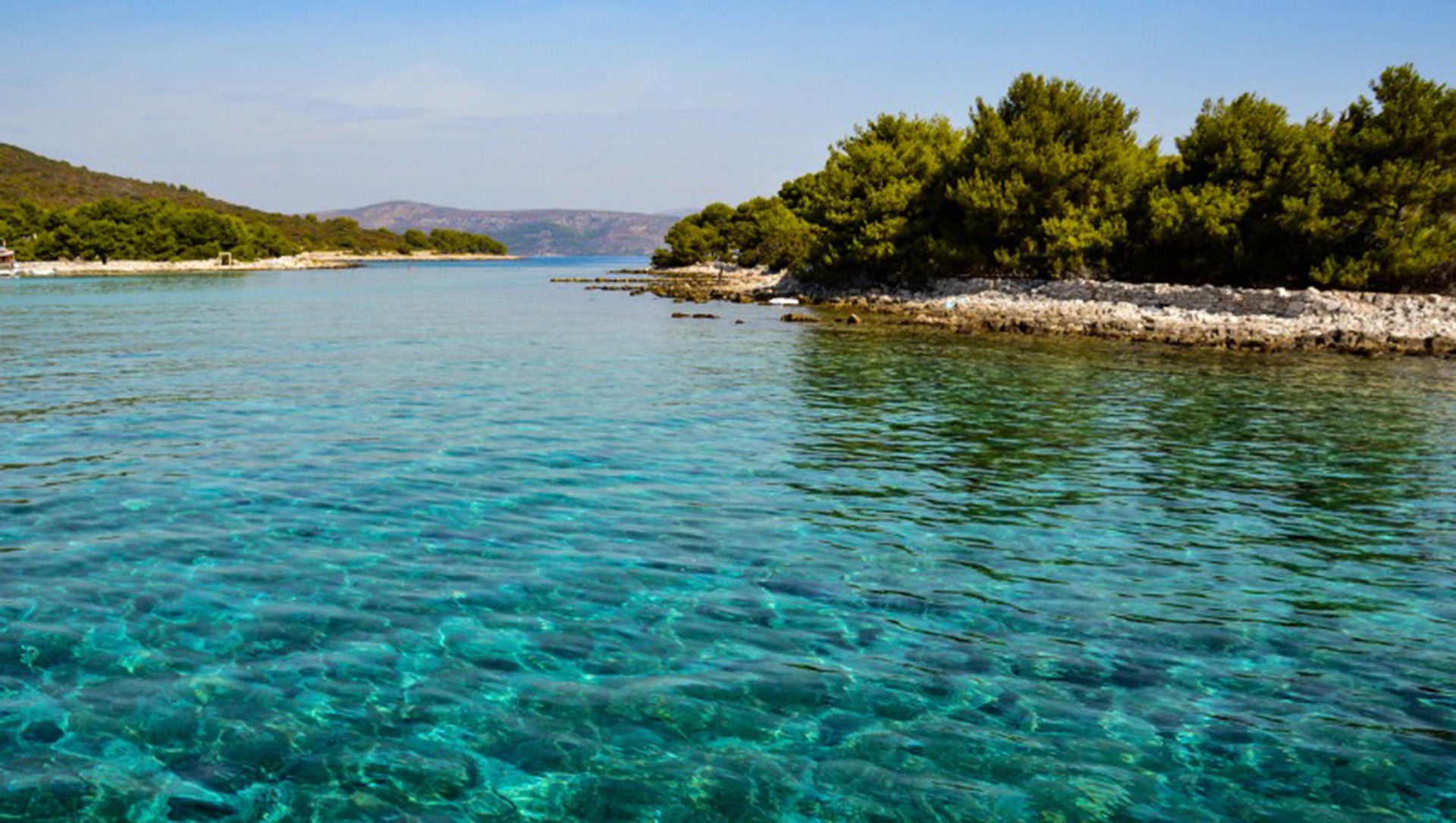 Blue water on the bay in Solta during a yacht charter vacation.