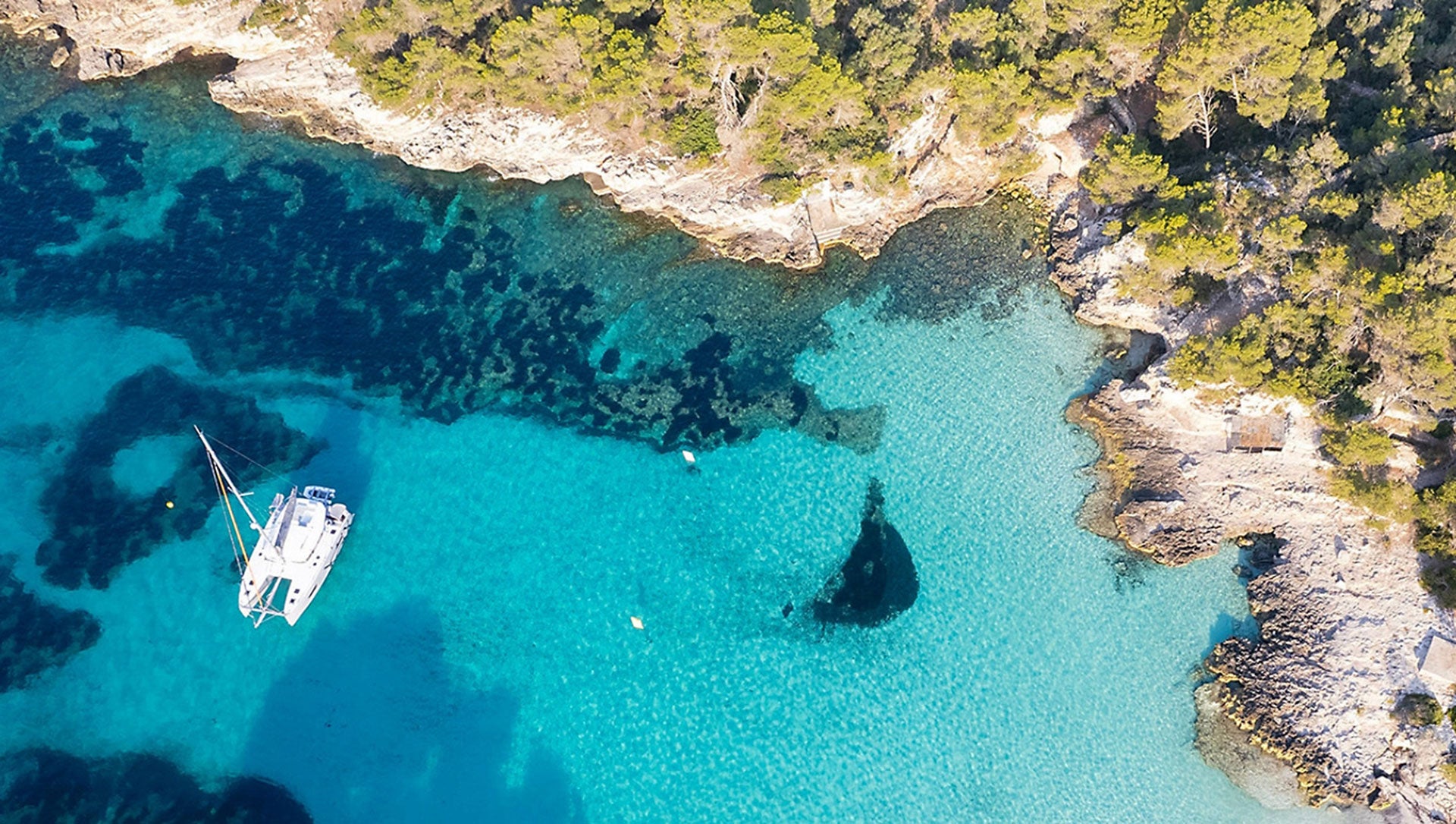 aerial view of the Excess 14 catamaran at anchor